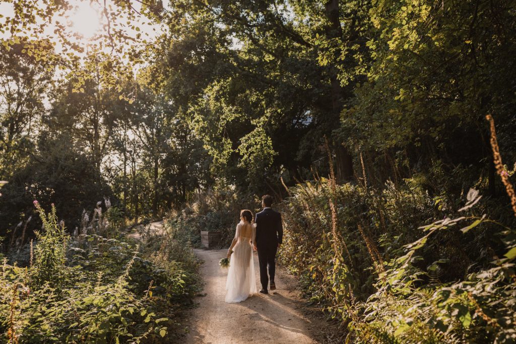 Wildhive Callow Hall wedding woodland photo with bride and groom